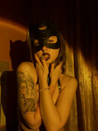 Busting out of my Catwoman outfit cover image