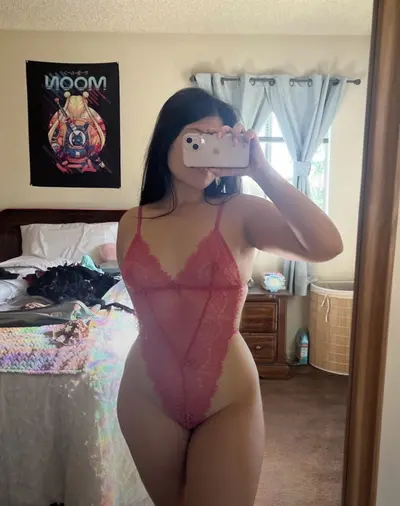 Latina in lingerie cover image