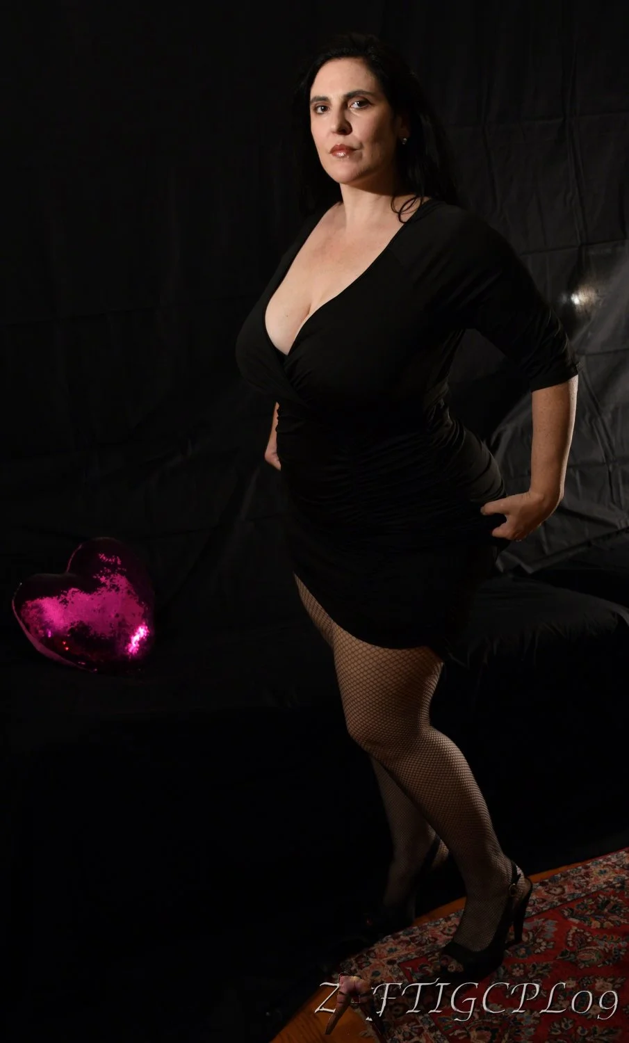 Mature BBW Webslut Mrs. Z strips out of her little black dress image 6