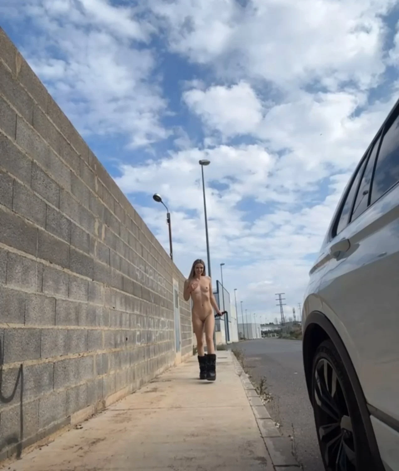 Crazy horny German walking around naked and riding her car knob main image