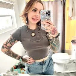Goth Slut Emily covered in tattoos main image