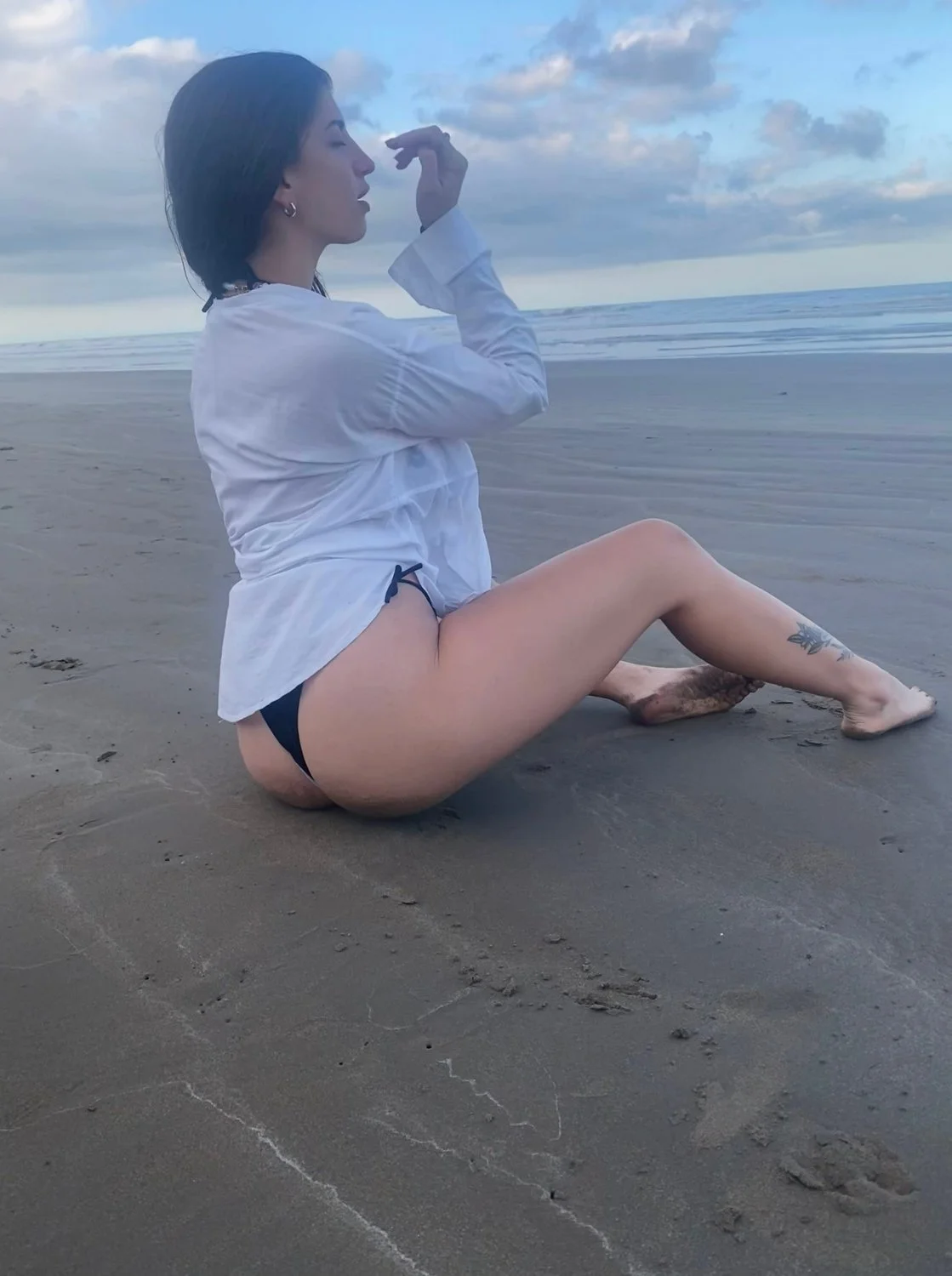 Just relaxing on the beach after a long workout main image
