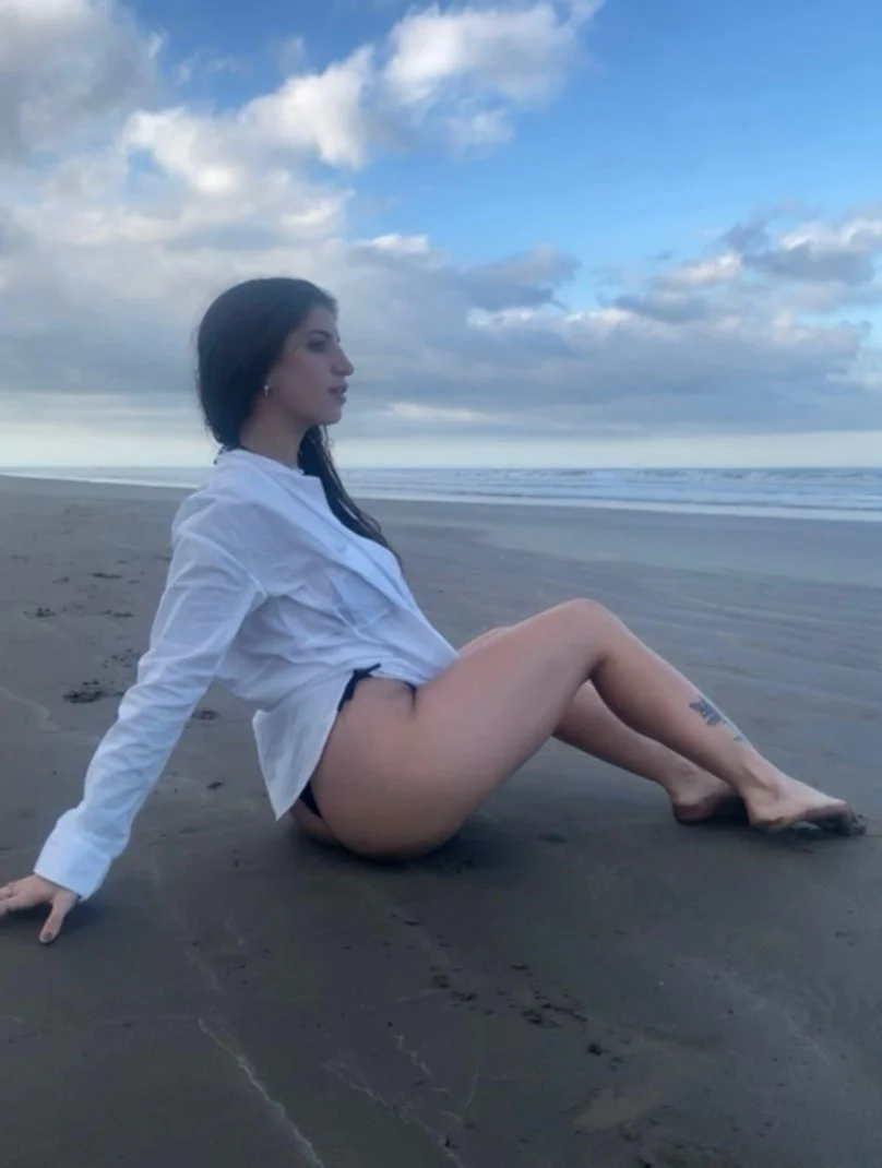 Just relaxing on the beach after a long workout image 2
