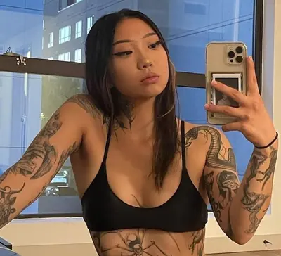 Inked brunette thot sucks cock like a pro cover image