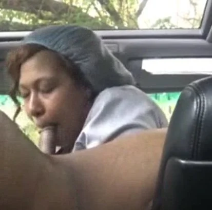 Black bitch sucking dick on hidden cam in the car (she caught the camera 😭😭) main image