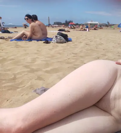 My shy wife got naked on a public beach surrounded by strangers cover image