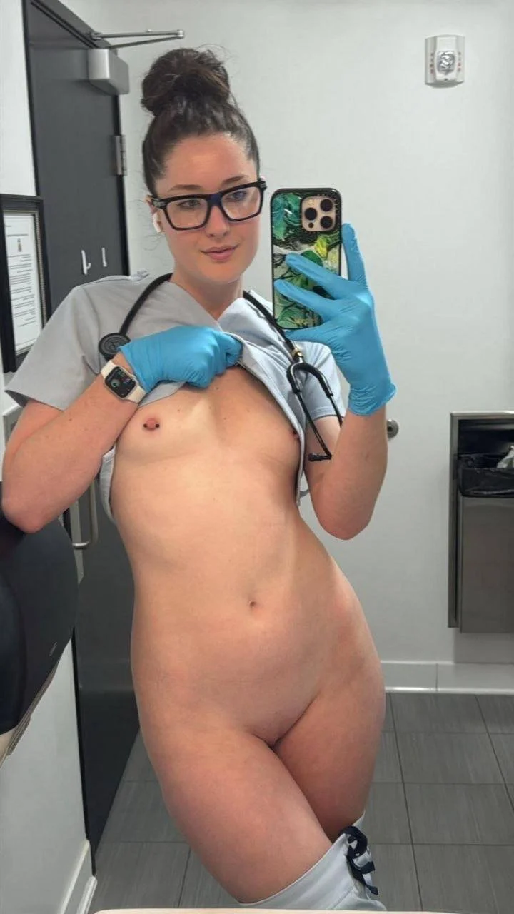Slim Maddie showing off her tiny tits image 5