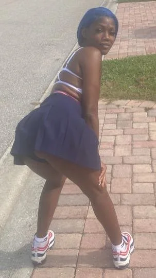 Shaved ebony slut image 13