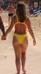My petite cousin in different colored bikinis image 2