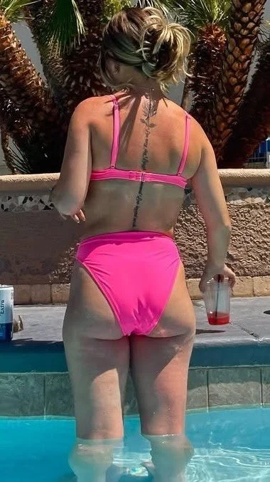 My petite cousin in different colored bikinis image 4