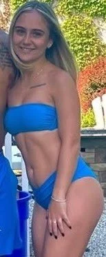 My petite cousin in different colored bikinis image 7