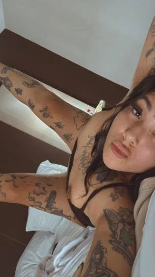 Tattted up latina image 10