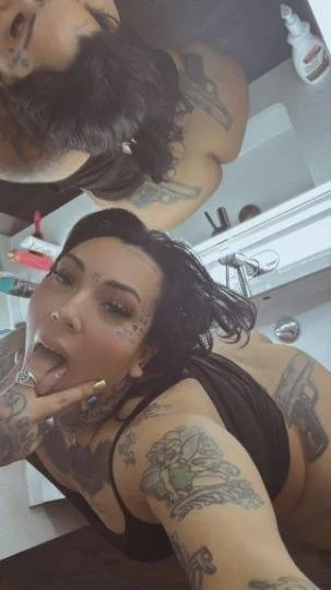 Tattted up latina image 12