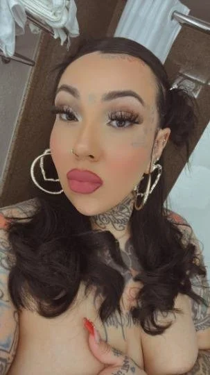 Tattted up latina image 15