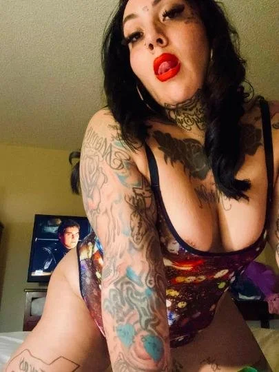 Tattted up latina image 17