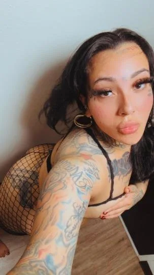 Tattted up latina image 5