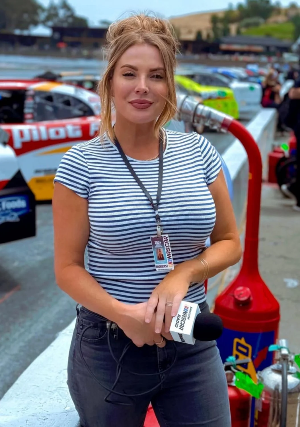 NASCAR reporter with huge fucking knockers. What a rack on that milf image 4