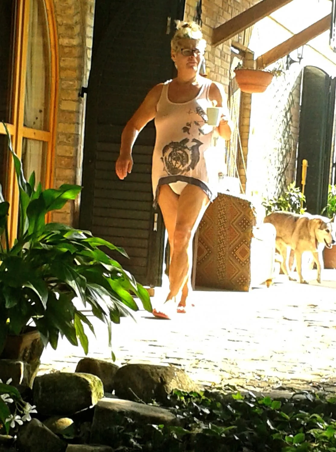 Giving the neighbours a glimpse of my mature thick body and big arse image 3