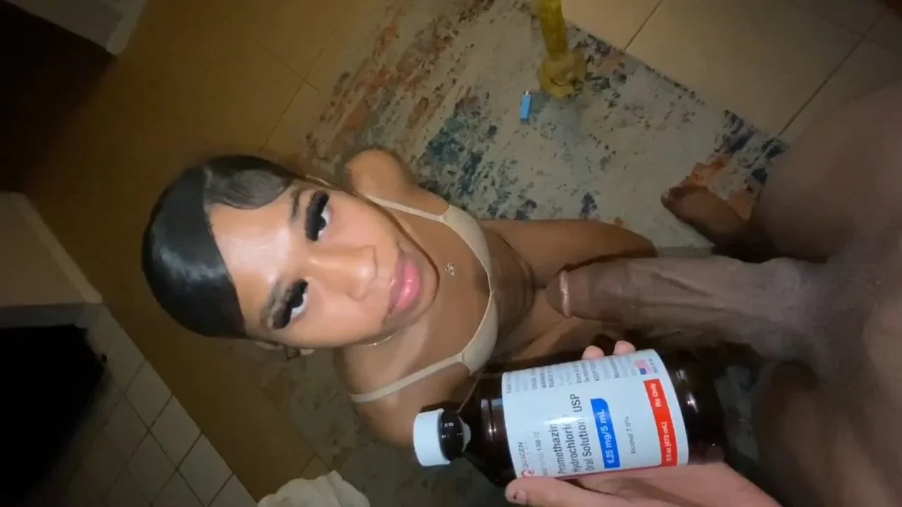 Caught !i!sis bsf red handed tonight.Came home early, found her on knees at my hidden stash, Wock bottle open & half empty. 'TF you doing with my Wock, nigga' She crawls & drains my cock for image 1