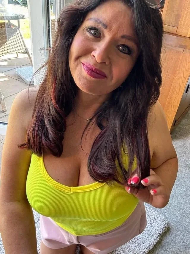 Latina grandma with big ass tits image 1