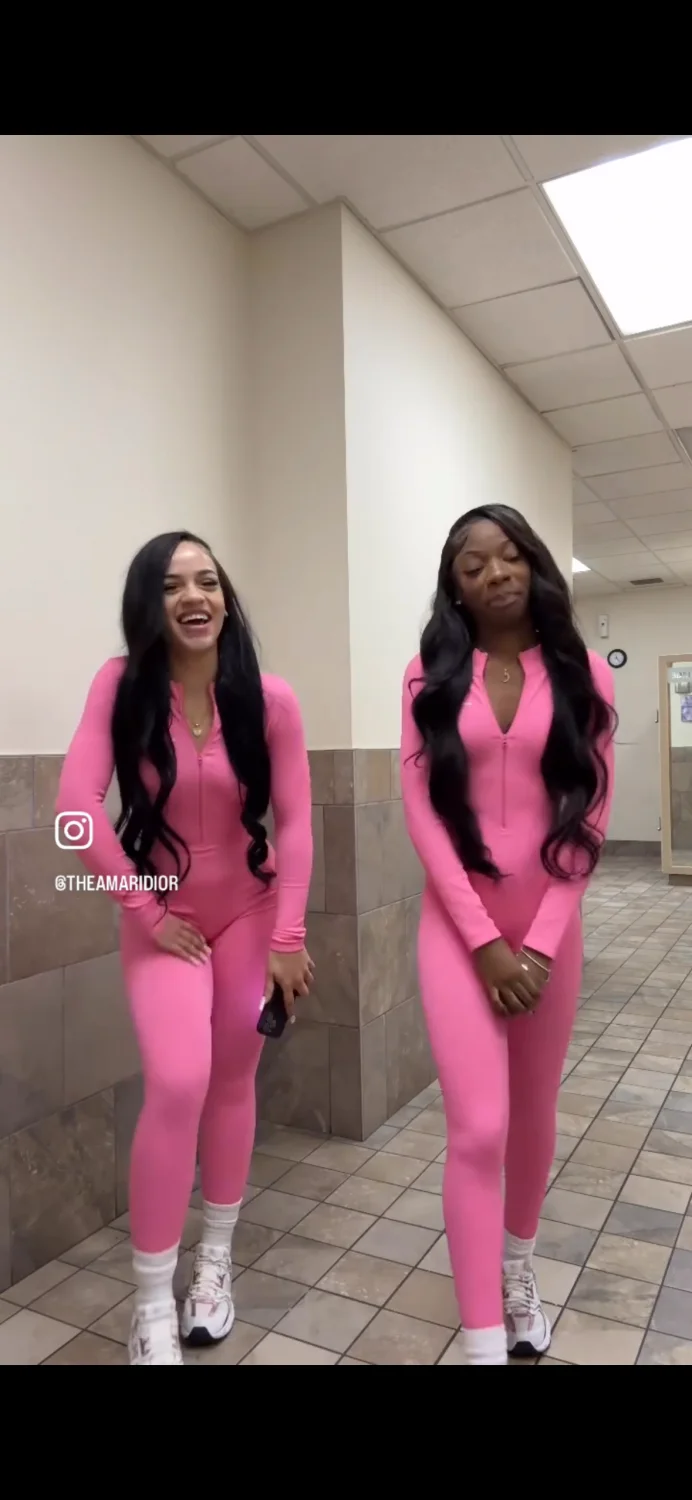 2 Cuties in sexy pink catsuit leggings at gym 🥵🔥 image 12
