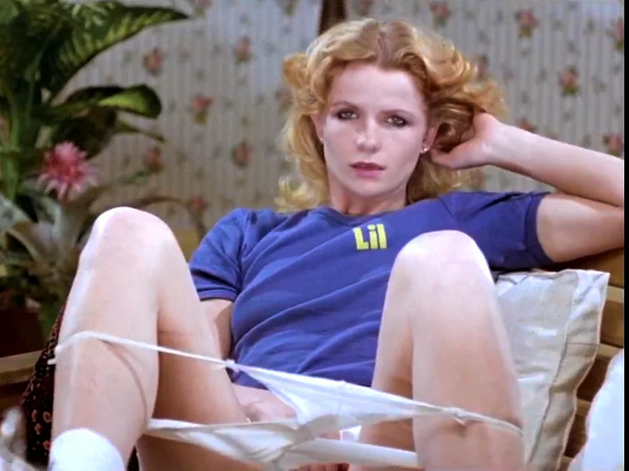 Retro bored blonde rubs her pussy lips main image