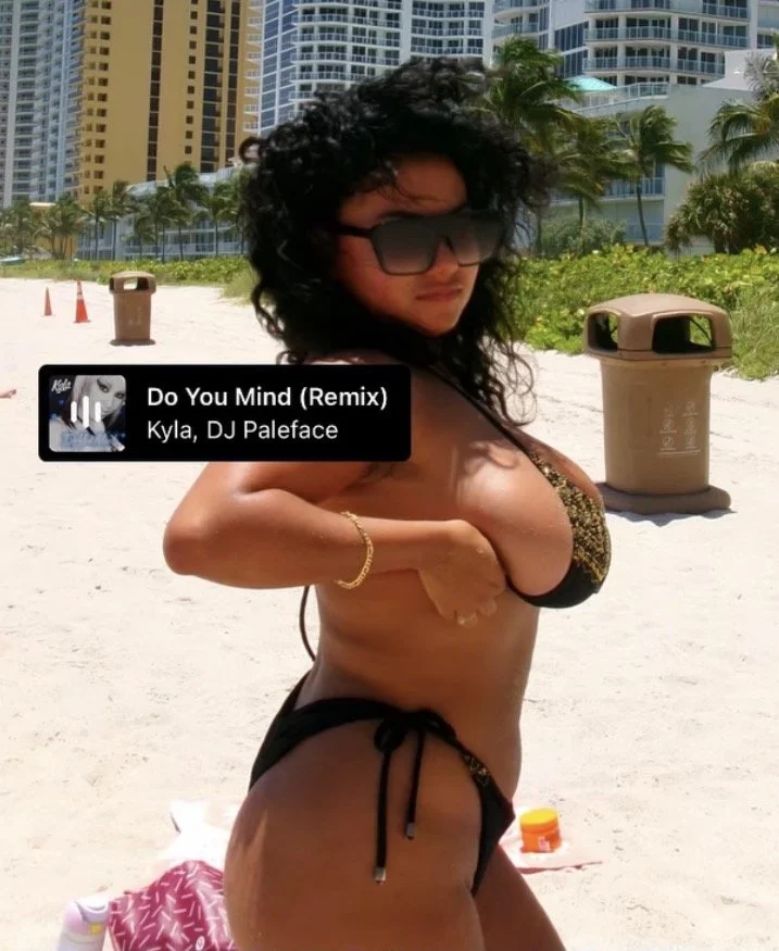 Them titties overflowing that bikini image 2