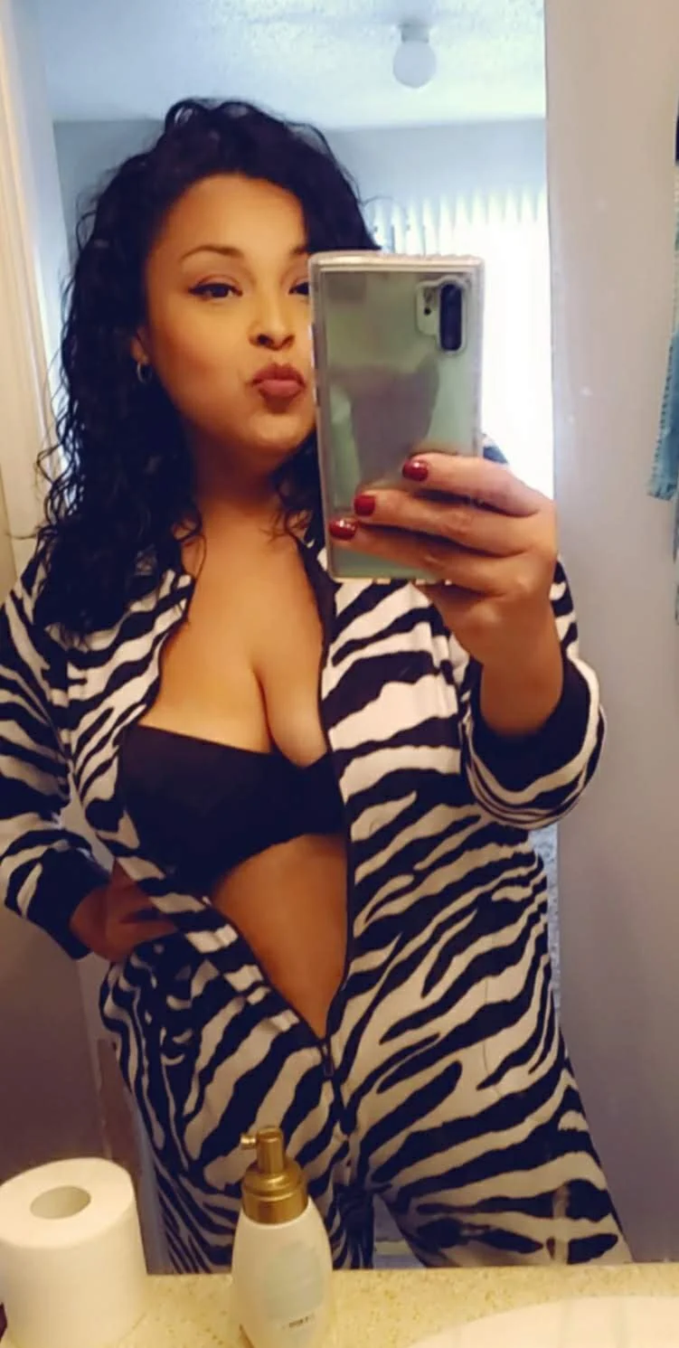 Milf taking pics in the showers image 2