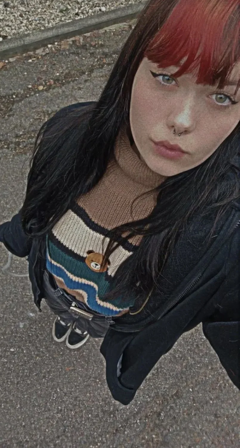 Hot goth teen with spicy tattooes exposed main image