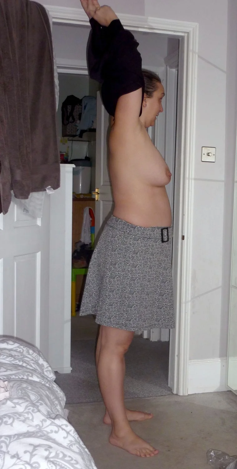Unaware wife caught dressing image 15