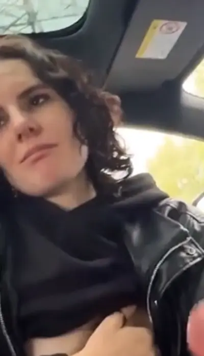Brunette whore sucks cock in the car cover image