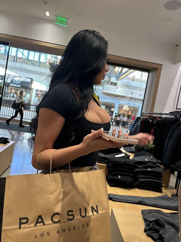 Creepshot Latina boobs bursting out main image
