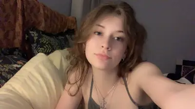 girl sticks cucumber up her pussy cover image