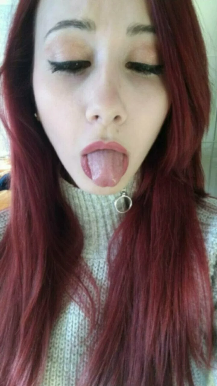 Redhead slut Raffaella image 9