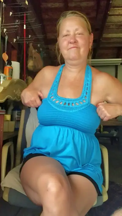 Mature cougar flashing her tits cover image
