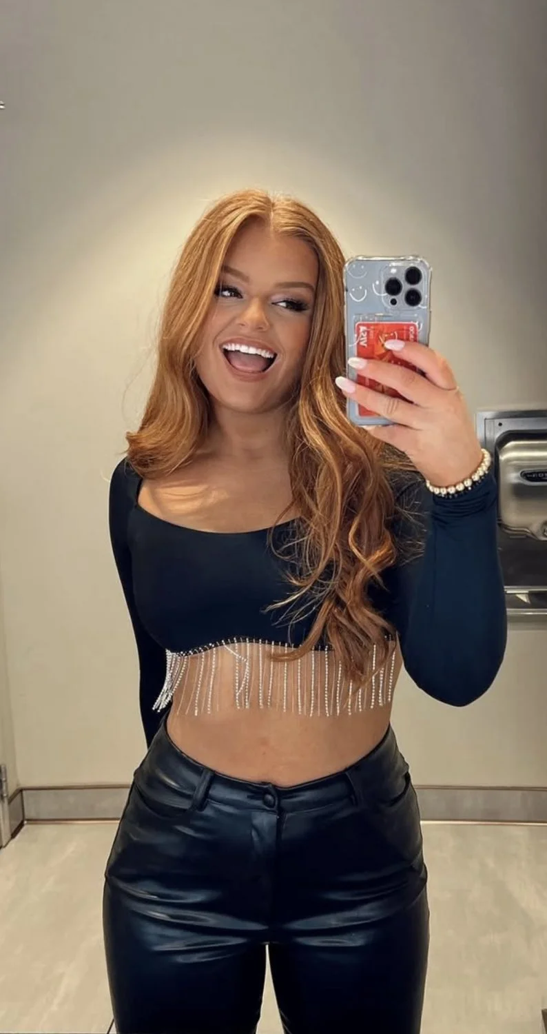 Sexy tan redhead college golfer with tight body image 21