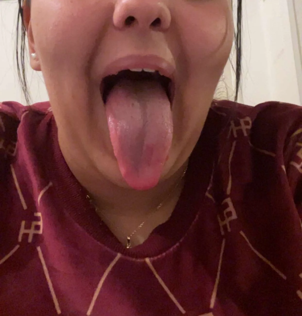 Hottie long tongue big tits image 2