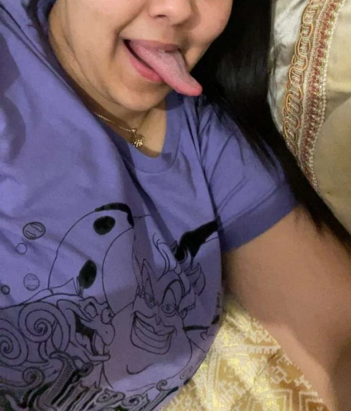 Hottie long tongue big tits image 5