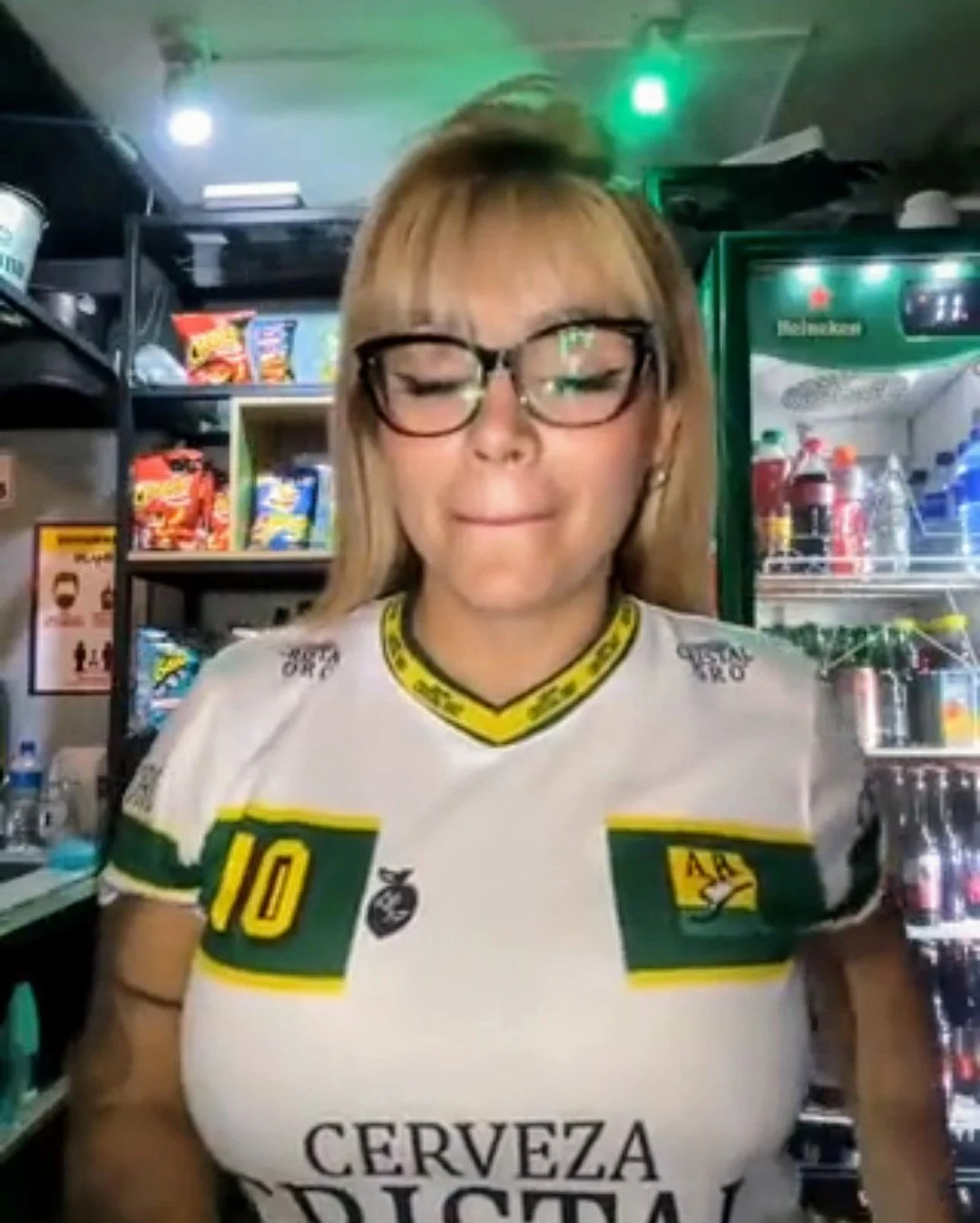 Liquor store attendant goes live naked while working image 16