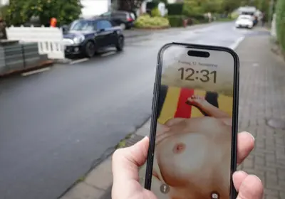 A stranger from erome using my wife's tits as his lockscreen in public cover image