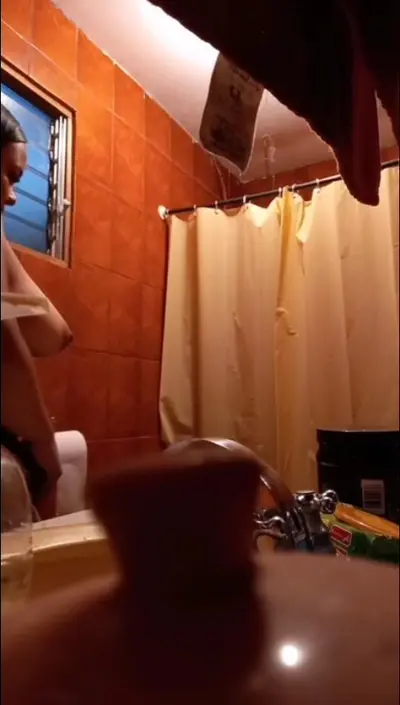 Spy on cousin taking shower cover image