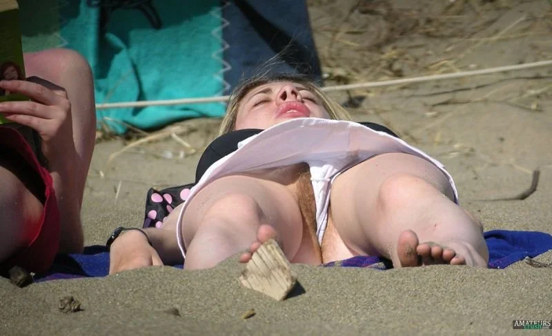 Pussy slip at the beach image 16