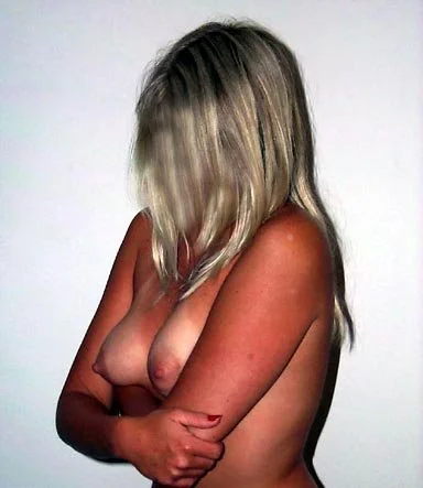 Blonde wife shows her tits image 6