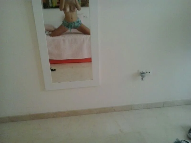 Petite teen with massive milkers image 4