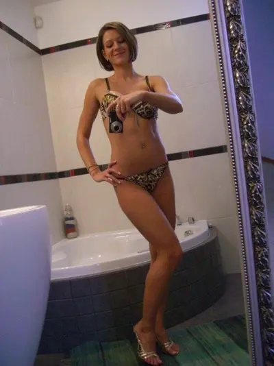 MILF shows off her leopard print underwear cover image