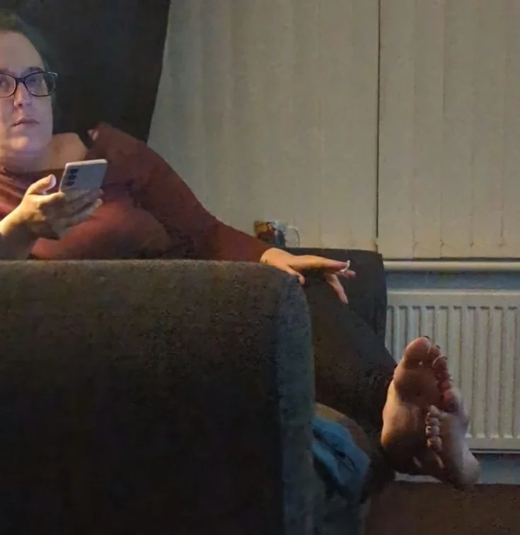 Watching stepmoms feet again. Barefoot and socks main image