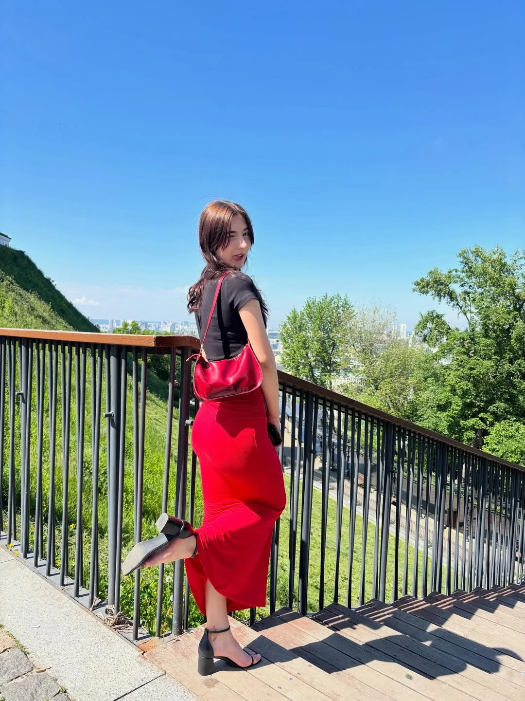 Red skirt and sexy feet. Caught image 10