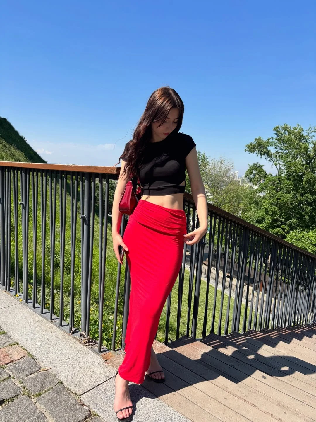 Red skirt and sexy feet. Caught image 11
