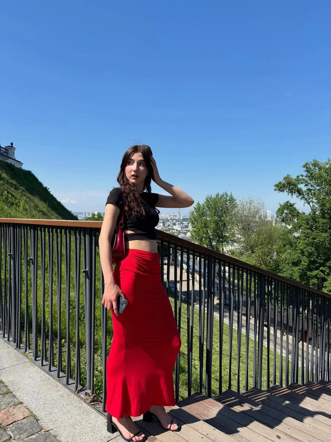 Red skirt and sexy feet. Caught image 7