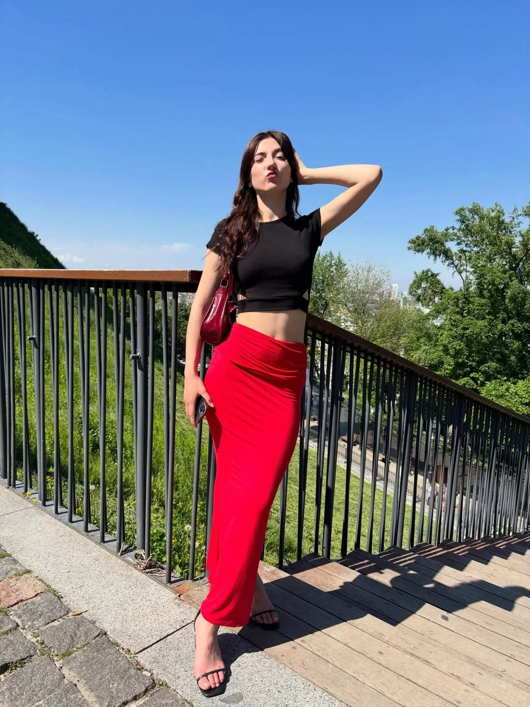Red skirt and sexy feet. Caught image 8